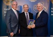 3 December 2016; Retiring Referee Michael Collins, Cork, accepts his presentation from Uachtarán Chumann Lúthchleas Aogán Ó Fearghail and Seán Walsh, Chairman of National Referee Development Committee, at the GAA National Referees' Awards Banquet 2016 at Croke Park in Dublin. Photo by Cody Glenn/Sportsfile