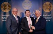 3 December 2016; Collum Cunning, Antrim, is presented with his All-Ireland Medal by Uachtarán Chumann Lúthchleas Aogán Ó Fearghail and Seán Walsh, Chairman of National Referee Development Committee, at the GAA National Referees' Awards Banquet 2016 at Croke Park in Dublin. Photo by Cody Glenn/Sportsfile