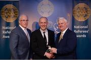 3 December 2016; Cathal McAllister, Cork, is presented with his All-Ireland Medal by Uachtarán Chumann Lúthchleas Aogán Ó Fearghail and Seán Walsh, Chairman of National Referee Development Committee, at the GAA National Referees' Awards Banquet 2016 at Croke Park in Dublin. Photo by Cody Glenn/Sportsfile