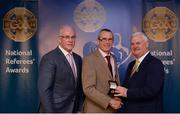 3 December 2016; Fergal Kelly, Longford, is presented with his All-Ireland Medal by Uachtarán Chumann Lúthchleas Aogán Ó Fearghail and Seán Walsh, Chairman of National Referee Development Committee, at the GAA National Referees' Awards Banquet 2016 at Croke Park in Dublin. Photo by Cody Glenn/Sportsfile