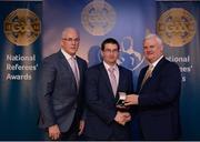 3 December 2016; Gavin Quilty, Kilkenny,, is presented with his All-Ireland Medal by Uachtarán Chumann Lúthchleas Aogán Ó Fearghail and Seán Walsh, Chairman of National Referee Development Committee, at the GAA National Referees' Awards Banquet 2016 at Croke Park in Dublin. Photo by Cody Glenn/Sportsfile
