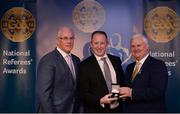 3 December 2016; Liam McAuley, Antrim, is presented with his All-Ireland Medal by Uachtarán Chumann Lúthchleas Aogán Ó Fearghail and Seán Walsh, Chairman of National Referee Development Committee, at the GAA National Referees' Awards Banquet 2016 at Croke Park in Dublin. Photo by Cody Glenn/Sportsfile