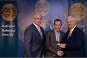 3 December 2016; `Niall Cullen, Fermanagh, is presented with his All-Ireland Medal by Uachtarán Chumann Lúthchleas Aogán Ó Fearghail and Seán Walsh, Chairman of National Referee Development Committee, at the GAA National Referees' Awards Banquet 2016 at Croke Park in Dublin. Photo by Cody Glenn/Sportsfile