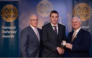 3 December 2016; Peter Burke, Kilkenny, is presented with his All-Ireland Medal by Uachtarán Chumann Lúthchleas Aogán Ó Fearghail and Seán Walsh, Chairman of National Referee Development Committee, at the GAA National Referees' Awards Banquet 2016 at Croke Park in Dublin. Photo by Cody Glenn/Sportsfile