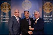 3 December 2016; Maurice Deegan, Laois, is presented with the Gold Referee Recognition Award for officiating 50 championship games by Uachtarán Chumann Lúthchleas Aogán Ó Fearghail and Seán Walsh, Chairman of National Referee Development Committee, at the GAA National Referees' Awards Banquet 2016 at Croke Park in Dublin. Photo by Cody Glenn/Sportsfile