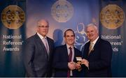 3 December 2016; David Coldrick, Meath, is presented with the Gold Referee Recognition Award for officiating 50 championship games by Uachtarán Chumann Lúthchleas Aogán Ó Fearghail and Seán Walsh, Chairman of National Referee Development Committee, at the GAA National Referees' Awards Banquet 2016 at Croke Park in Dublin. Photo by Cody Glenn/Sportsfile