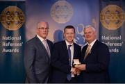 3 December 2016; Joe McQuillan, Cavan, is presented with the Gold Referee Recognition Award for officiating 50 championship games by Uachtarán Chumann Lúthchleas Aogán Ó Fearghail and Seán Walsh, Chairman of National Referee Development Committee, at the GAA National Referees' Awards Banquet 2016 at Croke Park in Dublin. Photo by Cody Glenn/Sportsfile