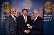 3 December 2016; Brian Gavin, Offaly, is presented with the Silver Referee Recognition Award for officiating 25 championship games by Uachtarán Chumann Lúthchleas Aogán Ó Fearghail and Seán Walsh, Chairman of National Referee Development Committee, at the GAA National Referees' Awards Banquet 2016 at Croke Park in Dublin. Photo by Cody Glenn/Sportsfile