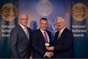 3 December 2016; Diarmuid Kirwan, Cork, is presented with the Silver Referee Recognition Award for officiating 25 championship games by Uachtarán Chumann Lúthchleas Aogán Ó Fearghail and Seán Walsh, Chairman of National Referee Development Committee, at the GAA National Referees' Awards Banquet 2016 at Croke Park in Dublin. Photo by Cody Glenn/Sportsfile