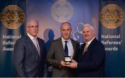 3 December 2016; Cormac Reilly, Meath, is presented with the Silver Referee Recognition Award for officiating 25 championship games by Uachtarán Chumann Lúthchleas Aogán Ó Fearghail and Seán Walsh, Chairman of National Referee Development Committee, at the GAA National Referees' Awards Banquet 2016 at Croke Park in Dublin. Photo by Cody Glenn/Sportsfile
