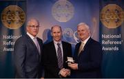 3 December 2016; Michael Collins, Cork, is presented with the Silver Referee Recognition Award for officiating 25 championship games by Uachtarán Chumann Lúthchleas Aogán Ó Fearghail and Seán Walsh, Chairman of National Referee Development Committee, at the GAA National Referees' Awards Banquet 2016 at Croke Park in Dublin. Photo by Cody Glenn/Sportsfile