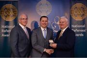 3 December 2016; Rory Hickey, Clare, is presented with the Silver Referee Recognition Award for officiating 25 championship games by Uachtarán Chumann Lúthchleas Aogán Ó Fearghail and Seán Walsh, Chairman of National Referee Development Committee, at the GAA National Referees' Awards Banquet 2016 at Croke Park in Dublin. Photo by Cody Glenn/Sportsfile