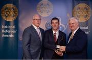 3 December 2016; Paud O'Dwyer, Carlow, is presented with his All-Ireland Medal by Uachtarán Chumann Lúthchleas Aogán Ó Fearghail and Seán Walsh, Chairman of National Referee Development Committee, at the GAA National Referees' Awards Banquet 2016 at Croke Park in Dublin. Photo by Cody Glenn/Sportsfile