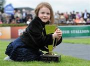 24 April 2011; Five-year-old Claudia Sharkey, from Foxrock Co. Dublin, with the Powers Gold Cup after her father's horse Realt Dubh won the Powers Gold Cup. Fairyhouse Easter Festival, Fairyhouse Racecourse, Fairyhouse, Co. Meath. Picture credit: Matt Browne / SPORTSFILE