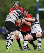 24 April 2011; Ger Molloy, Tullamore RFC, with support from team-mate Ivor Deverell, is tackled by Paul Meegan, left, and Cillian McDonald, Dundalk RFC. Newstalk Provincial Towns Cup Final, Dundalk RFC v Tullamore RFC, Edenderry RFC, Coolavacoose, Carbury, Co. Kildare. Picture credit: Barry Cregg / SPORTSFILE