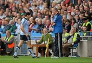 24 April 2011; Bernard Brogan, Dublin, passes manager Pat Gilroy as he is substituted during the second half after picking up an injury. Allianz Football League Division 1 Final, Dublin v Cork, Croke Park, Dublin. Picture credit: Stephen McCarthy / SPORTSFILE