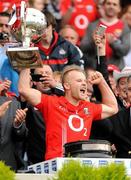 24 April 2011; Cork captain Michael Shields lifts the cup. Allianz GAA Football Division 1 Final, Dublin v Cork, Croke Park, Dublin. Picture credit: Dáire Brennan / SPORTSFILE