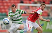 25 April 2011; Pat Flynn, Shamrock Rovers, in action against David McMillan, St Patrick's Athletic. EA Sports Cup, 2nd Round, Pool 3, St Patrick's Athletic v Shamrock Rovers, Richmond Park, Inchicore, Dublin. Picture credit: David Maher / SPORTSFILE