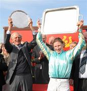 25 April 2011; Trainer Arthur Moore and jockey Nina Carberry celebrate after winning the Ladbrokes Irish Grand National Steeplechase with Organisedconfusion. Fairyhouse Easter Festival, Fairyhouse Racecourse, Fairyhouse, Co. Meath. Picture credit: Stephen McCarthy / SPORTSFILE