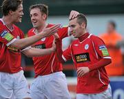 25 April 2011; Barry Clancy, right, Shelbourne, celebrates after scoring his side's third goal with team-mate's Stephen Paisley, left, and Karl Birmingham. EA Sports Cup, 2nd Round, Pool 4, Shelbourne v Bohemians, Tolka Park, Drumcondra, Dublin. Picture credit: David Maher / SPORTSFILE