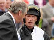 25 April 2011; Trainer Noel Meade in conversation with jockey Paul Carberry after he sent out Prima Vista to win the Rathbarry & Glenview Studs Novice Hurdle. Fairyhouse Easter Festival, Fairyhouse Racecourse, Fairyhouse, Co. Meath. Picture credit: Ray McManus / SPORTSFILE
