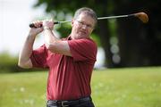 26 April 2011; Cork hurling manager Denis Walsh drives from the first tee at the launch of the 12th Annual All-Ireland GAA Golf Challenge. Waterford Castle Golf Club, Waterford. Picture credit: Matt Browne / SPORTSFILE