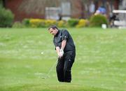26 April 2011; Waterford hurling manager Davy Fitzgerald pitches onto the 9th green at the launch of the 12th Annual All-Ireland GAA Golf Challenge. Waterford Castle Golf Club, Waterford. Picture credit: Matt Browne / SPORTSFILE