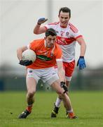 4 December 2016; Rory McGrugan of Armagh in action against Carl McWilliams of Derry during the O'Fiaich Cup Semi-Final match between Armagh and Derry at St Oliver Plunkett Park in Crossmaglen, Co Armagh. Photo by Piaras Ó Mídheach/Sportsfile