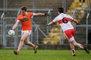 4 December 2016; Oisín O'Neill of Armagh in action against Carl McWilliams of Derry during the O'Fiaich Cup Semi-Final match between Armagh and Derry at St Oliver Plunkett Park in Crossmaglen, Co Armagh. Photo by Piaras Ó Mídheach/Sportsfile