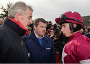 4 December 2016; Jockey Bryan Cooper in conversation with Apple's Jade's owner Michael O'Leary, left, of Gigginstown Stud alongside trainer Gordon Elliott in the parade ring after winning the Bar One Racing Hatton's Grace Hurdle at Fairyhouse Racecourse in Ratoath Co Meath. Photo by Cody Glenn/Sportsfile