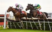 4 December 2016; Eventual winner Landofhopeandglory, right, with Barry Geraghty up, jump the last alongside Bapaume, with Ruby Walsh up, on their way to winning the Bar One Racing Juvenile Hurdle at Fairyhouse Racecourse in Ratoath Co Meath. Photo by Cody Glenn/Sportsfile