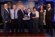 3 December 2016; Family members of the late referee Willie Walsh, Waterford, who refereed a total of nine All-Ireland Finals, including seven hurling and two football, grandson Seán Walsh, second from left, daughter Ita Power, fourth from left, granddaughter Máiréad Bourke, fifth from left, granddaughter Ursula Kenny, sixth from left, and great-grandson Neil Bourke, far right, accept the Hall of Fame Referee Presentation from Uachtarán Aogán Ó Fearghail, third from left, and Seán Walsh, far left, Chairman of National Referee Development Committee, at the GAA National Referees' Awards Banquet 2016 at Croke Park in Dublin. Photo by Cody Glenn/Sportsfile