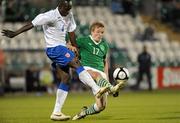 28 April 2011; John Mountney, Republic of Ireland U18, in action against Cliff Moyo, England U18. Centenary Shield, Republic of Ireland U18 v England U18, Tallaght Stadium, Tallaght, Co. Dublin. Picture credit: Pat Murphy / SPORTSFILE