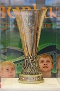 29 April 2011; Six-year-old Darragh Leonard and his brother eight-year-old Cillian, right, from Leixlip, Co. Kildare, admire the UEFA Cup before the Bohemians v Derry City game. St. Peters National School, St. Peters Road, Dublin. Picture credit: Matt Browne / SPORTSFILE