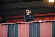 29 April 2011; Bohemians manager Pat Fenlon watches the match from the stand after he was sent off by referee Padraig Sutton. Airtricity League Premier Division, Bohemians v Derry City, Dalymount Park, Dublin. Picture credit: Matt Browne / SPORTSFILE