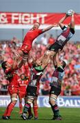 30 April 2011; George Robson, Harlequins, wins possession for his side in the lineout ahead of Mick O'Driscoll, Munster. Amlin Challenge Cup Semi-Final, Munster v Harlequins, Thomond Park, Limerick. Picture credit: Matt Browne / SPORTSFILE