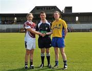 30 April 2011; Captains, Elaine Finn, left, Westmeath, and Laura Sharkey, Roscommon, with referee Sean Joy. Bord Gais Energy National Football League Division Four Final, Westmeath v Roscommon, Cusack Park, Ennis, Co. Clare. Picture credit: David Maher / SPORTSFILE
