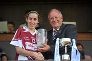 30 April 2011; Pat Quill, President, Cumann Peil Gael na mBan, presents the Bord Gais Energy National Football League Division Four Final Player of the Match award to Karen Hegarty, Westmeath. Bord Gais Energy National Football League Division Four Final, Westmeath v Roscommon, Cusack Park, Ennis, Co. Clare. Picture credit: David Maher / SPORTSFILE