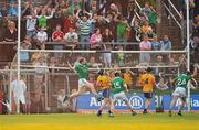 30 April 2011; Kevin Downes, left, Limerick, celebrates after scoring his side's fourth goal late in the game. Allianz Hurling League Division 2 Final, Clare v Limerick, Cusack Park, Ennis, Co. Clare. Picture credit: David Maher / SPORTSFILE