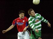13 December 2001; Peter Hutton of Shelbourne in action against David Lynch of Workmans Dunleary during the FAI Carlsberg Cup Second Round match between Workmans Dunleary and Shelbourne at the Carlisle Grounds in Bray. Photo by Matt Browne/Sportsfile