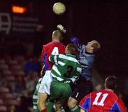 13 December 2001; Colin Kelly of Workmans Dunleary in action against Tony McCarthy and  Darren Coffey of Shelbourne during the FAI Carlsberg Cup Second Round match between Workmans Dunleary and Shelbourne at the Carlisle Grounds in Bray. Photo by Matt Browne/Sportsfile