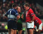 15 December 2001; Referee Nigel Whitehouse speaks to captains Reggie Corrigan of Leinster and Mick Galwey of Munster after showing a red card to Eric Miller of Leinster during the Celtic League Final match between Leinster and Munster at Lansdowne Road in Dublin. Photo by Brendan Moran/Sportsfile