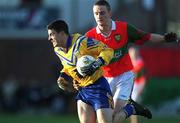 16 December 2001; Senan Connell of Na Fianna in action against Richard Dignam of Rathnew during the AIB Leinster Senior Club Football Championship Final match between Na Fianna and Rathnew at St Conleth's Park in Newbridge, Kildare. Photo by Brendan Moran/Sportsfile