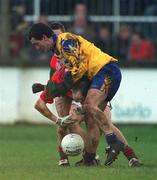 16 December 2001; Mark Coffey of Rathnew in action against Ian Foley of Na Fianna during the AIB Leinster Senior Club Football Championship Final match between Na Fianna and Rathnew at St Conleth's Park in Newbridge, Kildare. Photo by Brendan Moran/Sportsfile