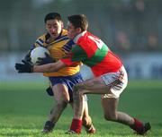16 December 2001; Jason Sherlock of Na Fianna in action against Damian Power of Rathnew during the AIB Leinster Senior Club Football Championship Final match between Na Fianna and Rathnew at St Conleth's Park in Newbridge, Kildare. Photo by Brendan Moran/Sportsfile