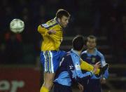 18 December 2001; Don Trienay of Drogheda United in action against Ciaran Martyn of UCD during the FAI Carlsberg Cup Second Round Replay match between UCD and Drogheda United at Belfield Park in Dublin. Photo by David Maher/Sportsfile