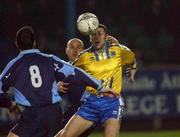 18 December 2001; Don Trienay of Drogheda United in action against Paul Doolin and Ciaran Martyn of UCD during the FAI Carlsberg Cup Second Round Replay match between UCD and Drogheda United at Belfield Park in Dublin. Photo by David Maher/Sportsfile