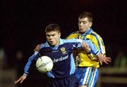 18 December 2001; Kevin Grogan of UCD in action against Stuart Smith of Drogheda United during the FAI Carlsberg Cup Second Round Replay match between UCD and Drogheda United at Belfield Park in Dublin. Photo by David Maher/Sportsfile