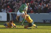 22 December 2001; Ross McCarron of Ireland is tackled by Chris Siale of Australia during the International Schools Friendly match between Ireland and Australia at Temple Hill in Cork. Photo by Matt Browne/Sportsfile