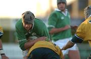 22 December 2001; Jonathan Rockett of Ireland is tackled by Joe Tufuga of Australia during the International Schools Friendly match between Ireland and Australia at Temple Hill in Cork. Photo by Matt Browne/Sportsfile